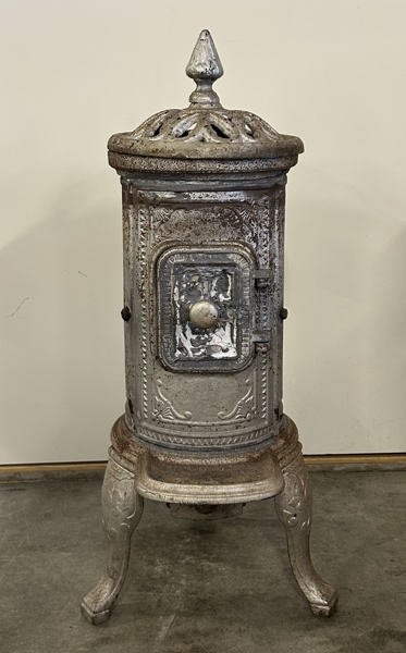Kamin, gjutjärn.