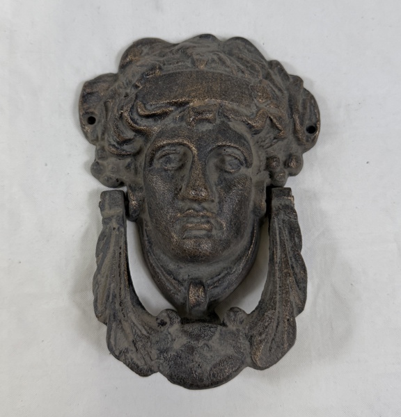 Dörrklapp, gjutgods, samtida.