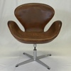 Arne Jacobsen. Fåtölj, "Svanen", Fritz Hansen, Danmark, Cognac Skinn, 1965.