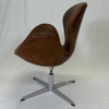 Arne Jacobsen. Fåtölj, "Svanen", Fritz Hansen, Danmark, Cognac Skinn, 1965.