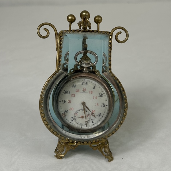 Fickursställ med fickur, Omega.