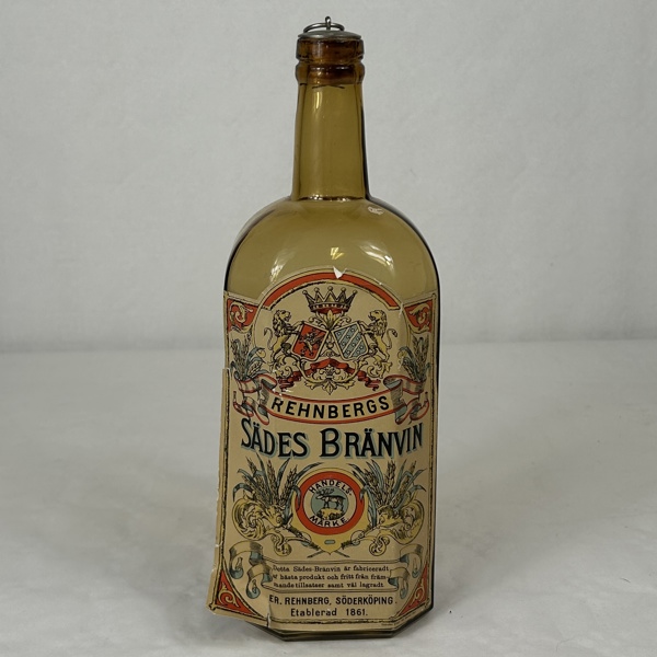 Flaska, "Rehnbergs Sädes Bränvin", 1900-tal.