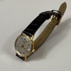 Tissot. Damarmbandsur, 18K guld.