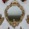 Spegel, förgylld, med dekor.