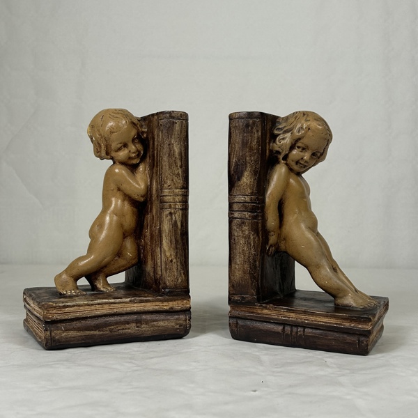 Bokstöd, ett par, gips, 1900-tal.