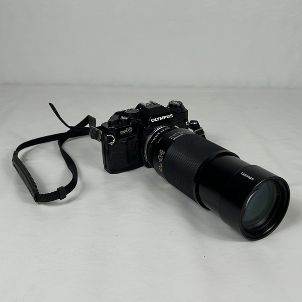 Kamera, Olympus 40, samt objektiv.