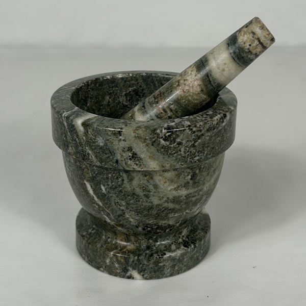 Mortel med stöt, marmor.