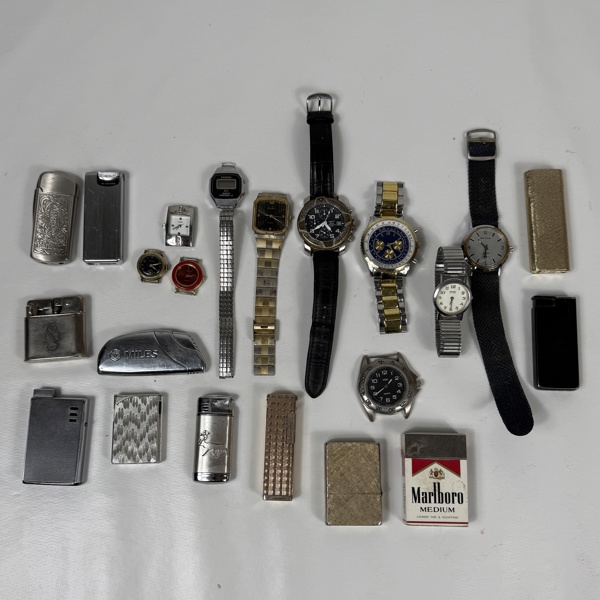 Parti armbandsur och tändare, 1900-tal.