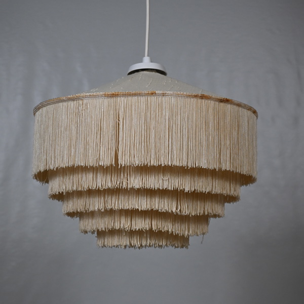 Taklampa i textil, 1900-tal.