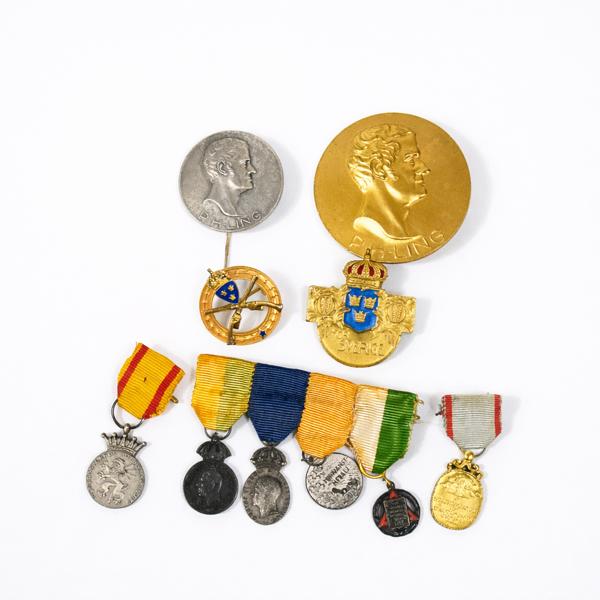 Parti medaljer i silver.