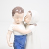Figurin i porslin, pojke och flicka, Bing & Gröndahl. 