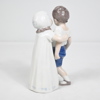 Figurin i porslin, pojke och flicka, Bing & Gröndahl. 