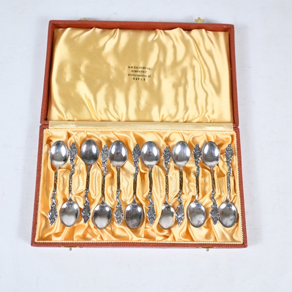 Kaffeskedar i silver, 12st, 830.