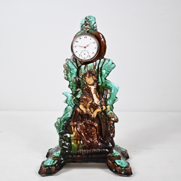 Fickurställ, med fickur, silver, 1900-talets första hälft. 