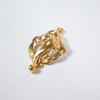 Brosch i 18k guld. 