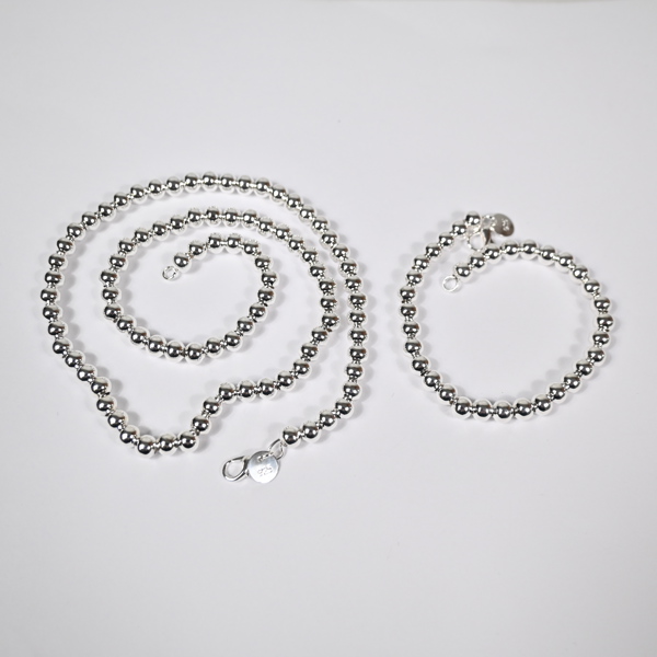 Halsband och armband, sterlingsilver. 