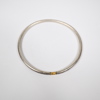 Suzanne Färnet, armring, sterlingsilver med detalj i 18k guld.