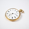 Fickur i 18k guld.