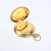 Fickur i 18k guld.