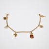 Armband med berlocker, 18k guld, bismarck-länk.