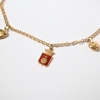 Armband med berlocker, 18k guld, bismarck-länk.