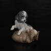 Figurin, lekande hundar, porslin, Lladro, Spanien. 