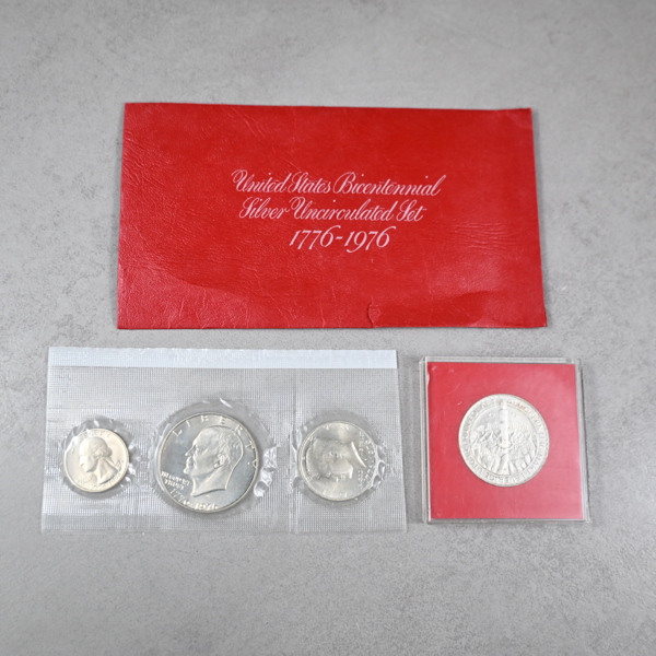 Silvermynt, 4st, Sverige och USA.