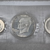 Silvermynt, 4st, Sverige och USA.