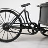 Blomlåda i form av bagare på cykel, metall.