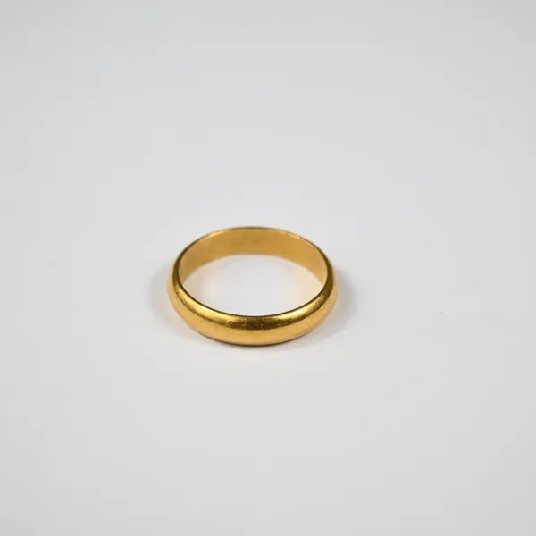 Ring i 23k guld.
