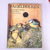 Fågelmatare, 2st, samt bok "Fågelholken". 