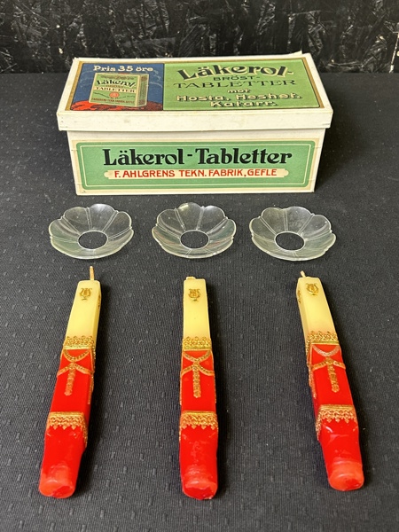 Äldre ask Läkerol + ljus och ljusmanschetter 
