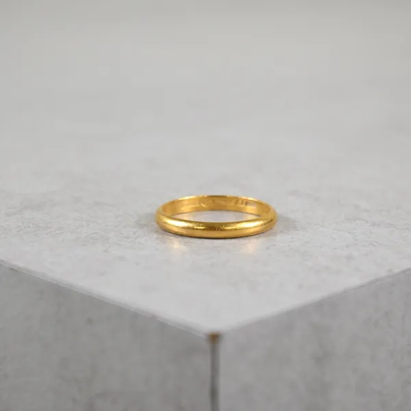 Ring i 23k guld.