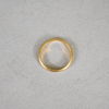 Ring i 23k guld.