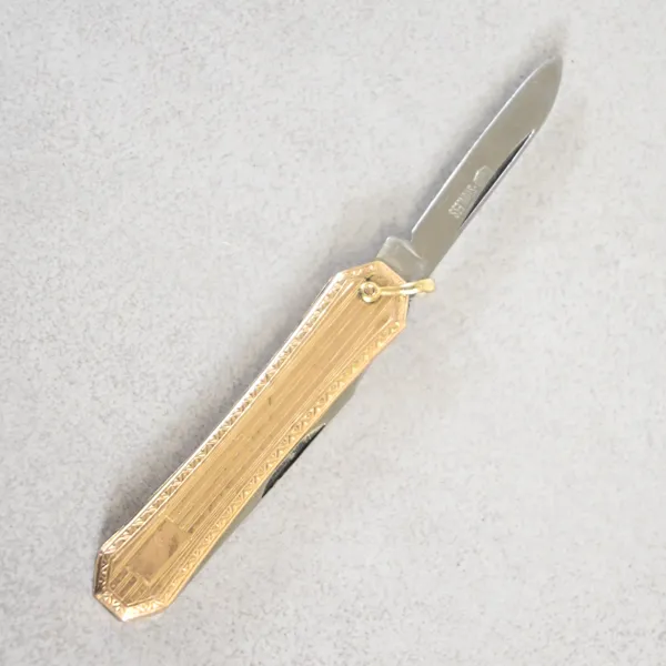Fickkniv, 10k guld, 1915. 