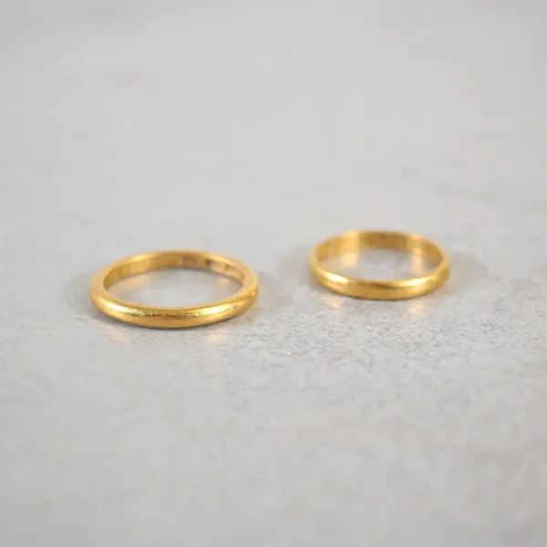 Ringar, 2st, 23k guld.