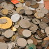 Parti mynt och sedlar.