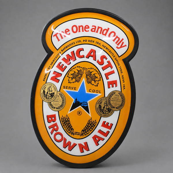 Reklamskylt, "Newcastle Brown Ale", omkring år 2000-tal.