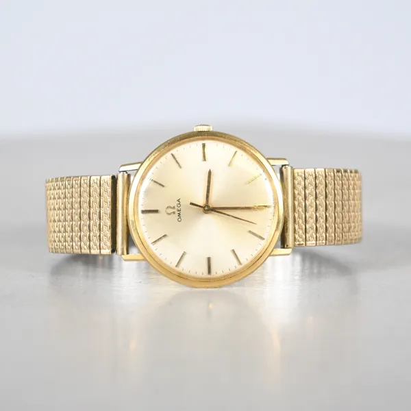 Armbandsur, 18k guld, Omega, 34 mm.
