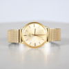 Armbandsur, 18k guld, Omega, 34 mm. 
