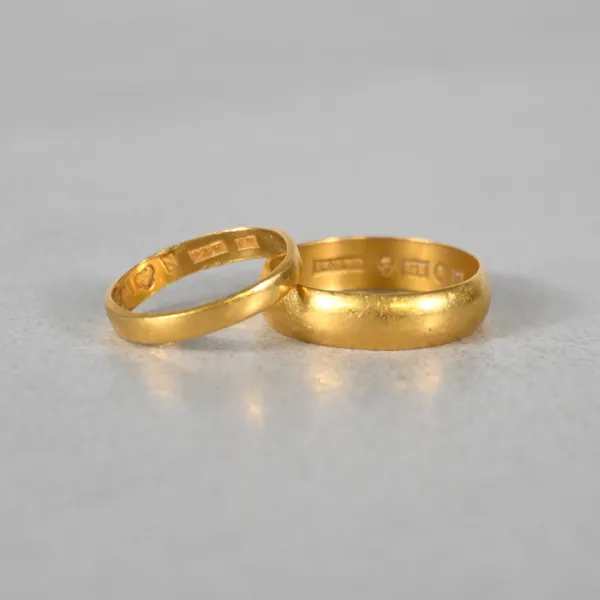 Ringar, 2st, 23k guld.
