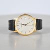Armbandsur, 18k guld, Certina, 34 mm.
