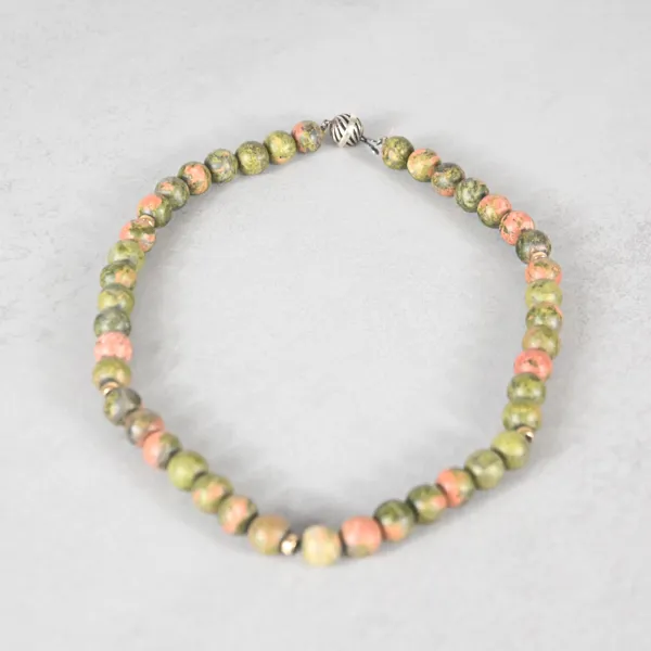 Collier, unakit, silver samt 14k guld.