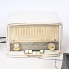 Skrivmaskin, vevgrammofon, radio samt stenkakor, 1900-talets första hälft.