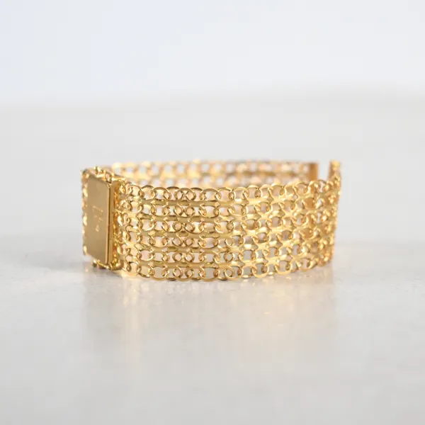 Klockarmband, X-länk, 18k guld, 1989.