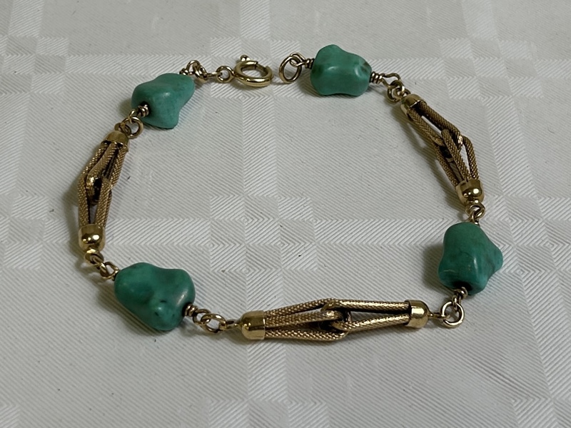 Armband 18K guld, med stenar.